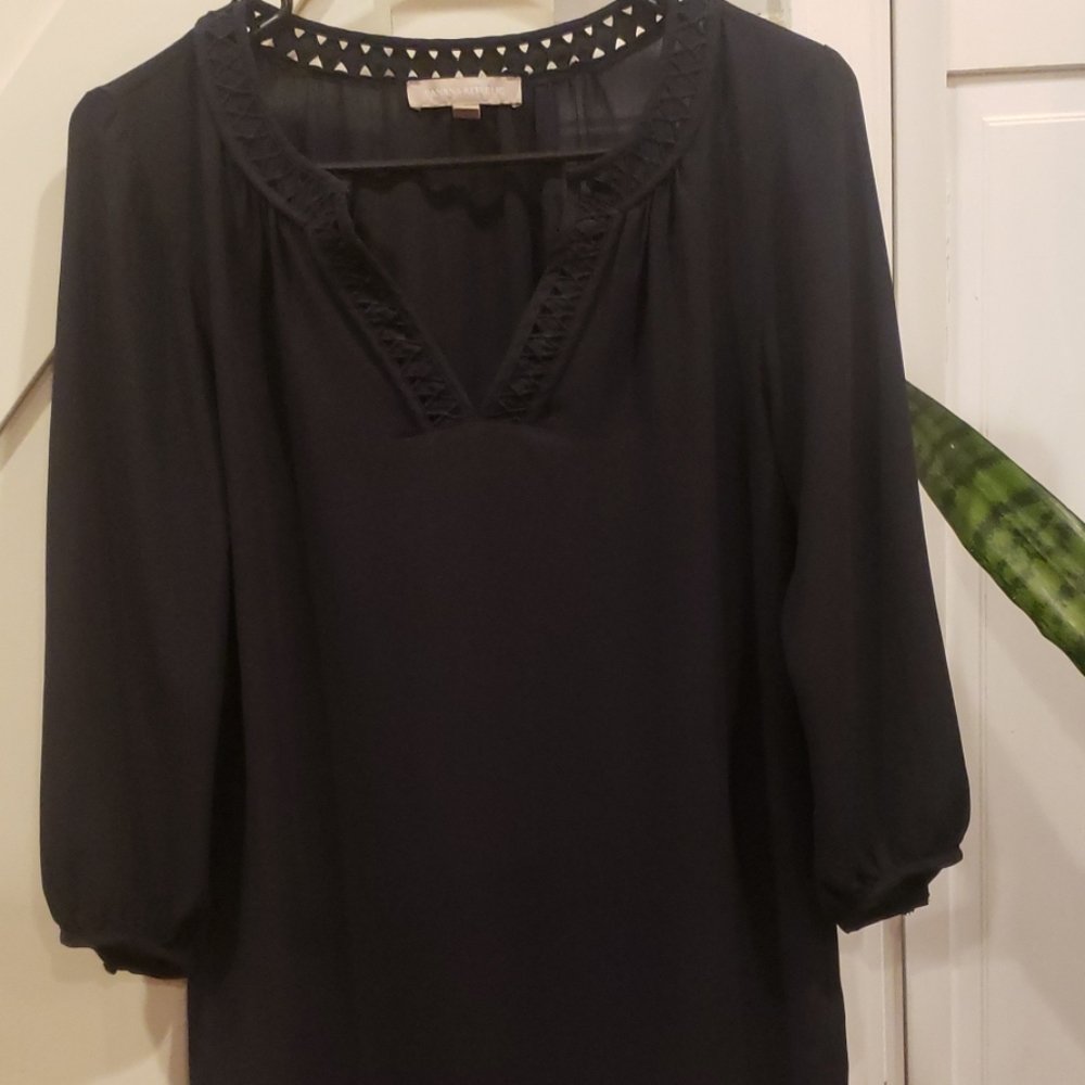 Blouse flowing with beautiful V shaped neck.